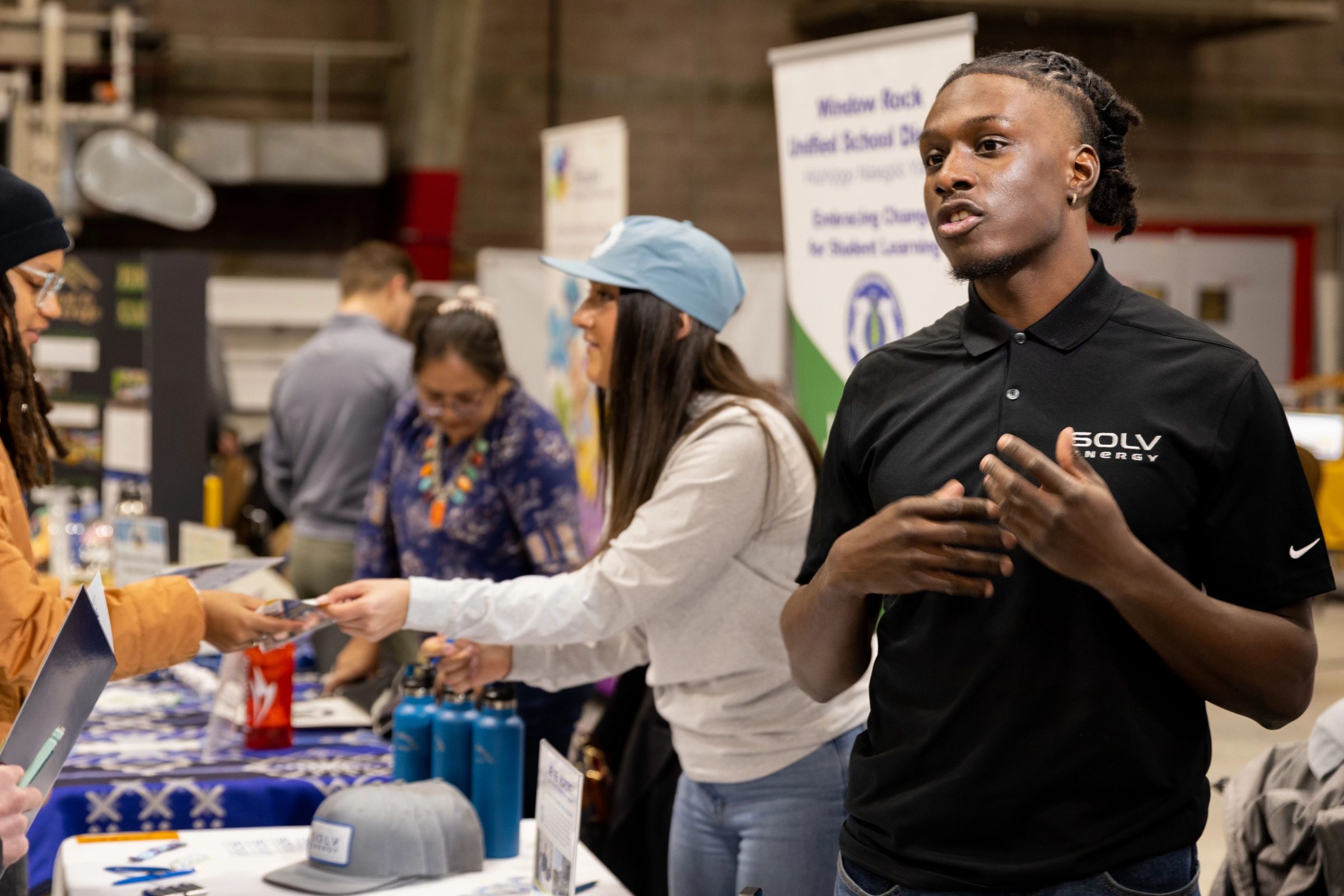 Students helping out at the N A U career fair.
