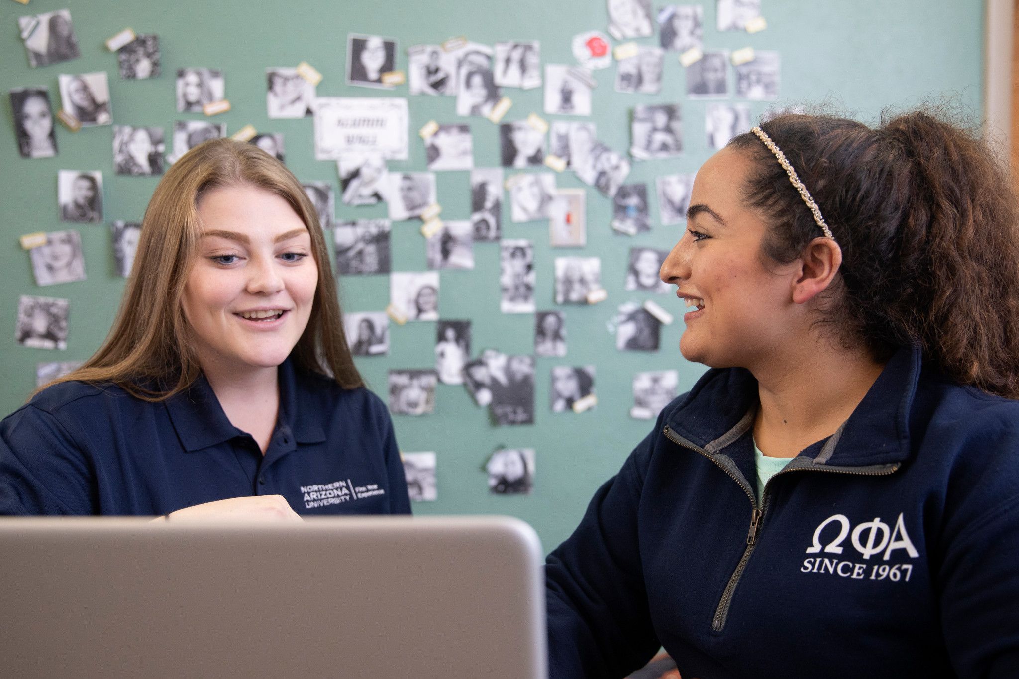 Student talking to advisor about first year experience.