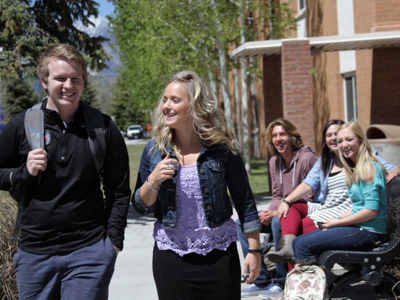 A photo of students walking on campus.