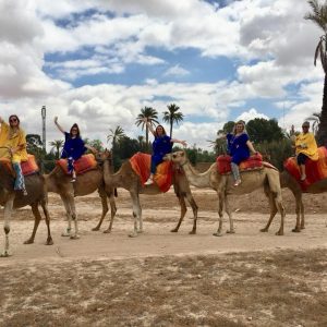 People riding camels.