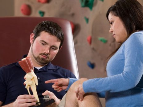 Two students looking a model.