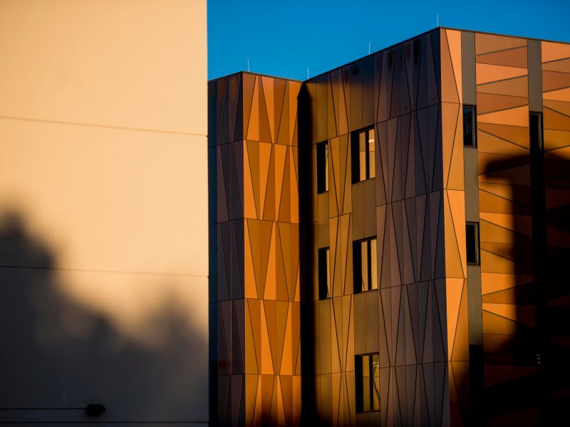 N A U Flagstaff building glowing in a sunset.