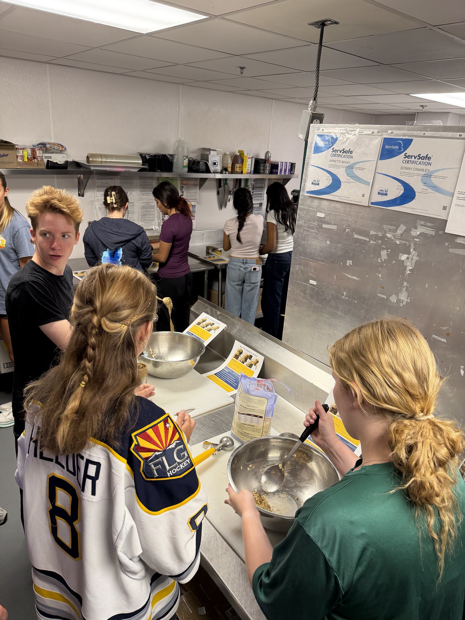 Students cook healthy snacks in NAU kitchens.