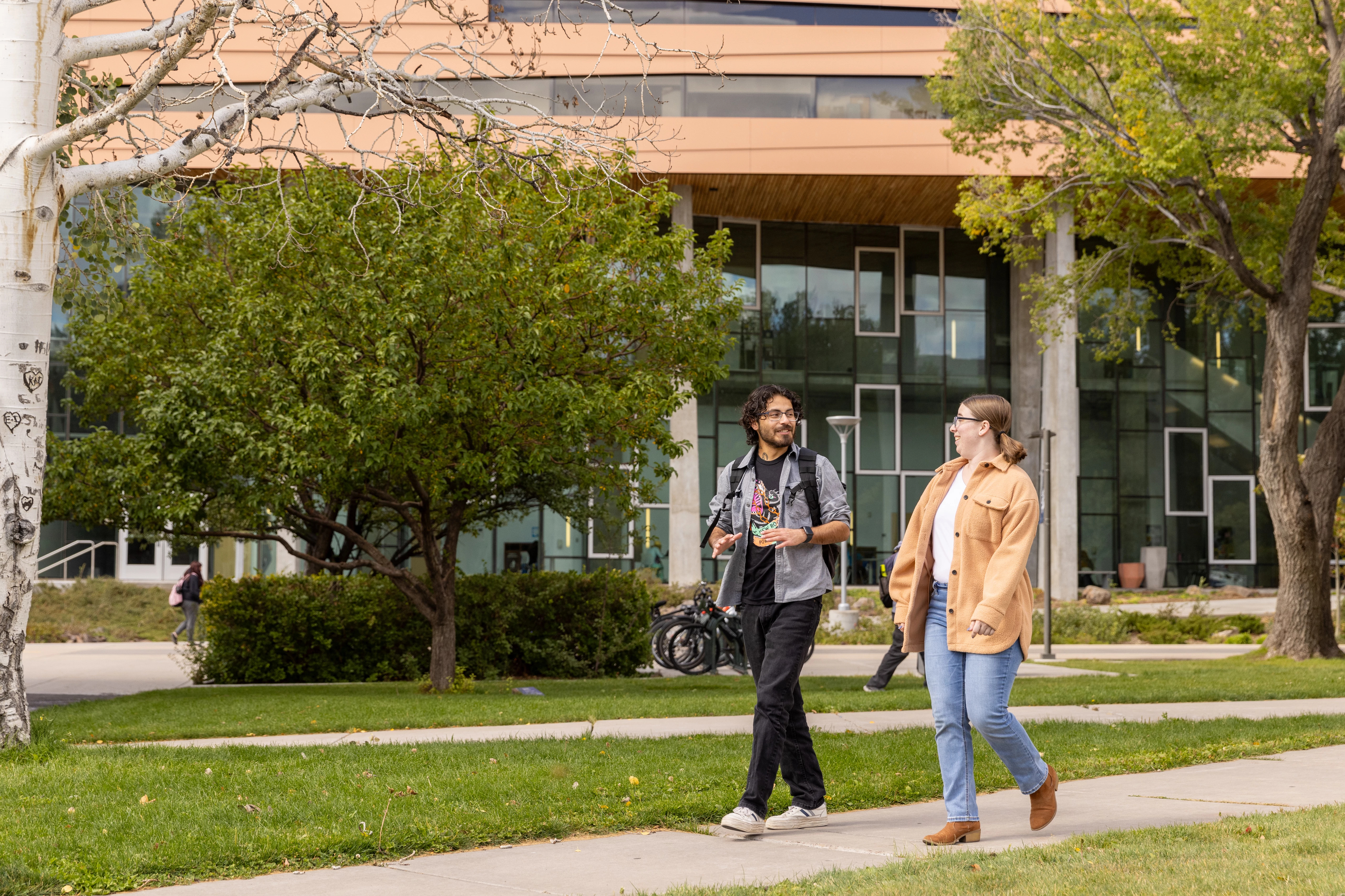 Students discussing and walking.