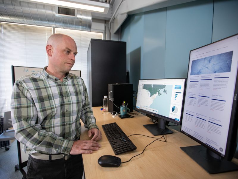 Ben ruddell working on a computer.