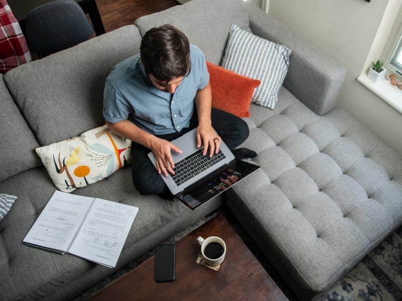 Student working on a computer from home.