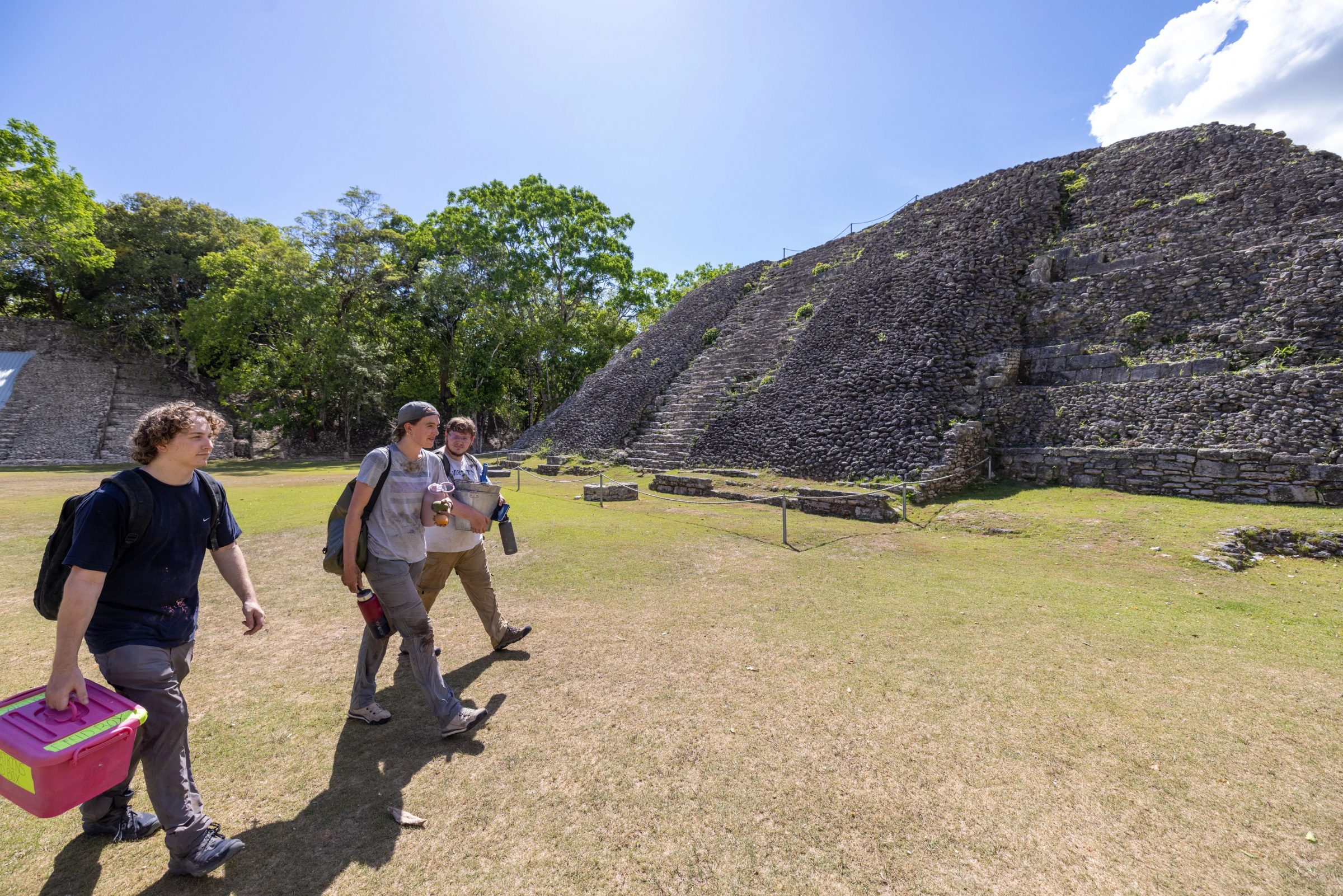 Three N A U archaeology students on their way to examine Maya ruins in Belize.