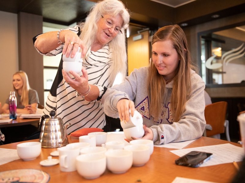 N A U students at a breakfast meeting.