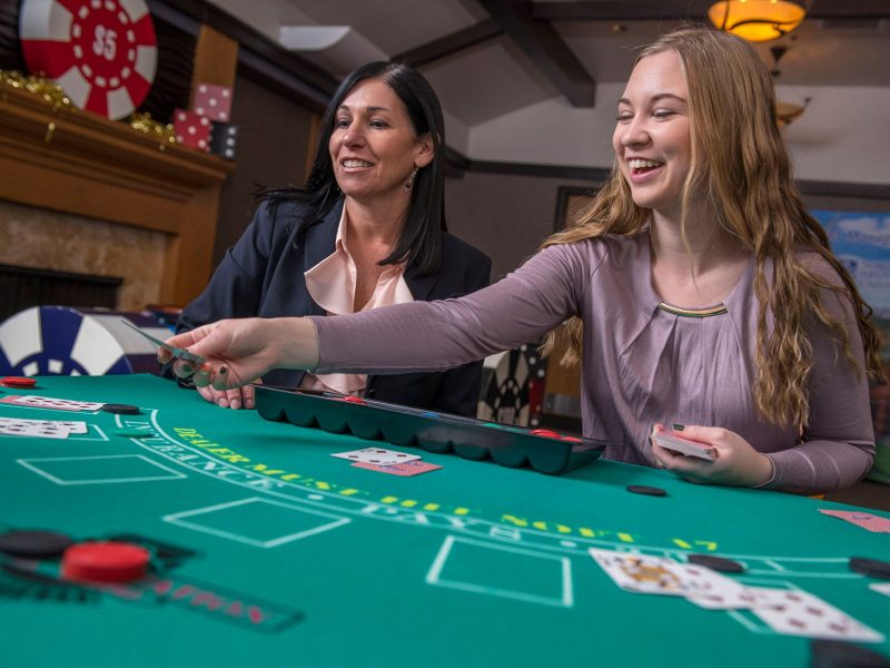 Student and instructor at Casino Night.