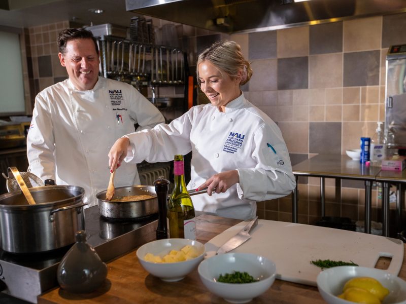 Teacher and student in the culinary class.