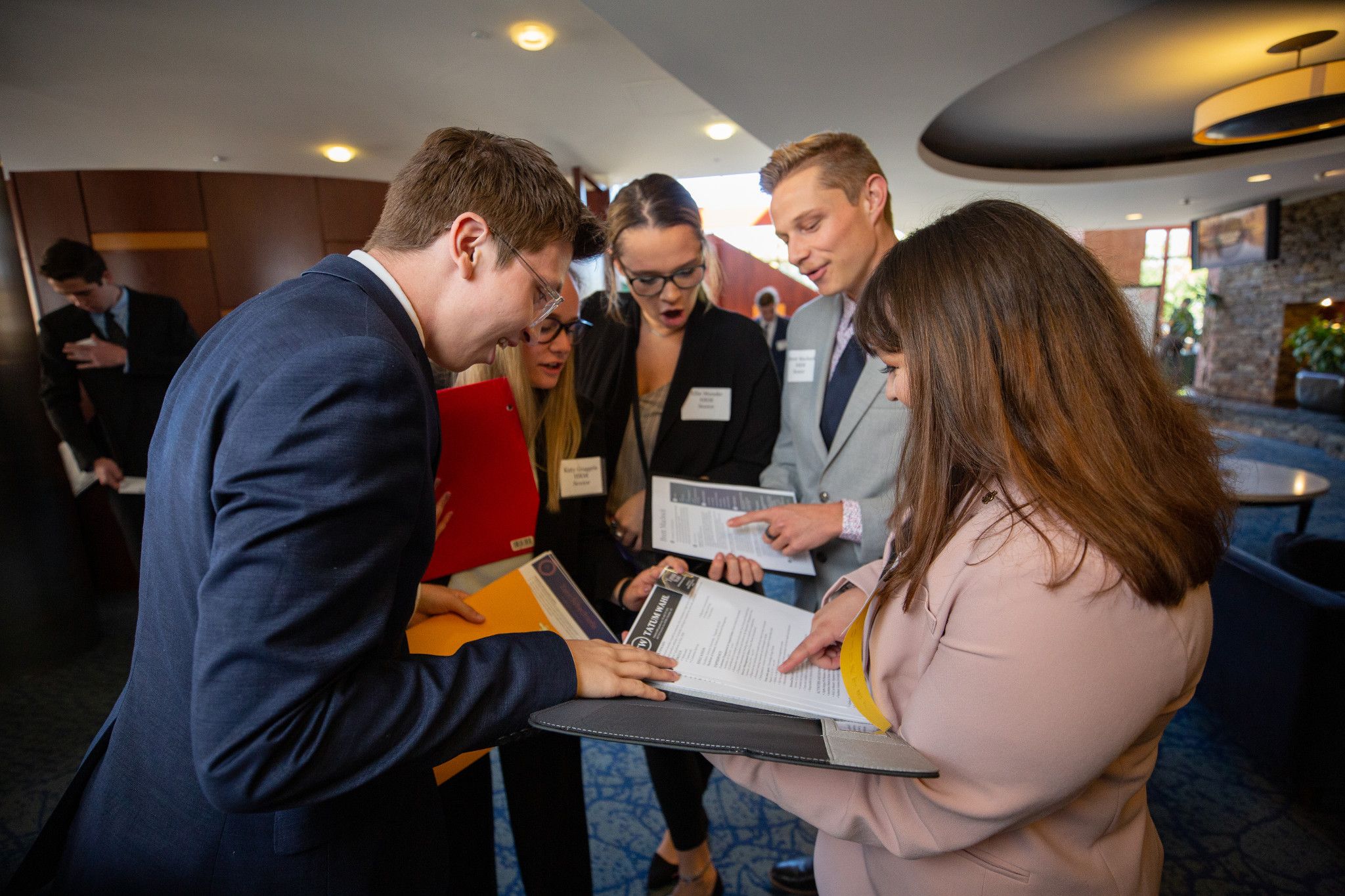 H R M students talking with employers at Career Fair.