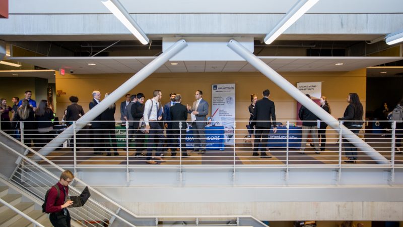 Students and employers participating in the business career fair.