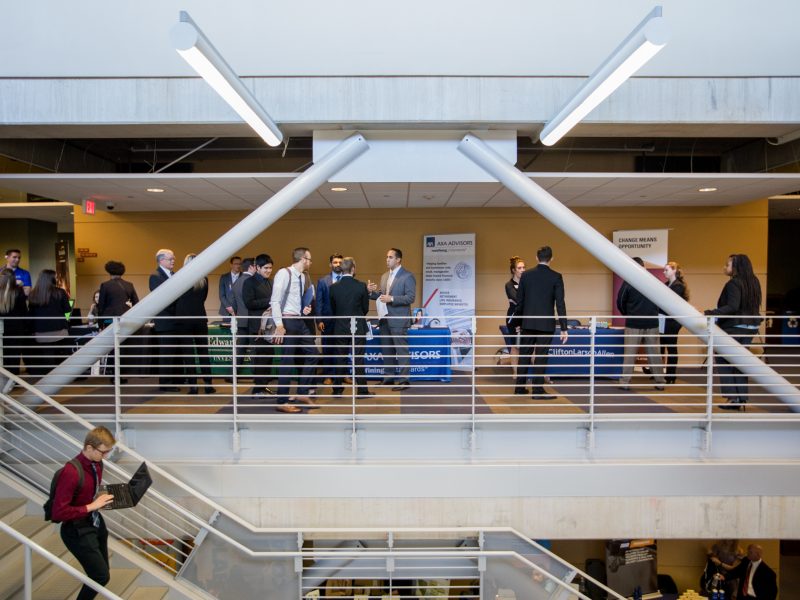 Students and employers participating in the business career fair.