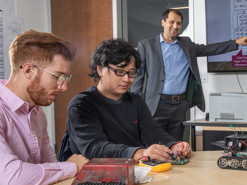Students participating in a robotics club.