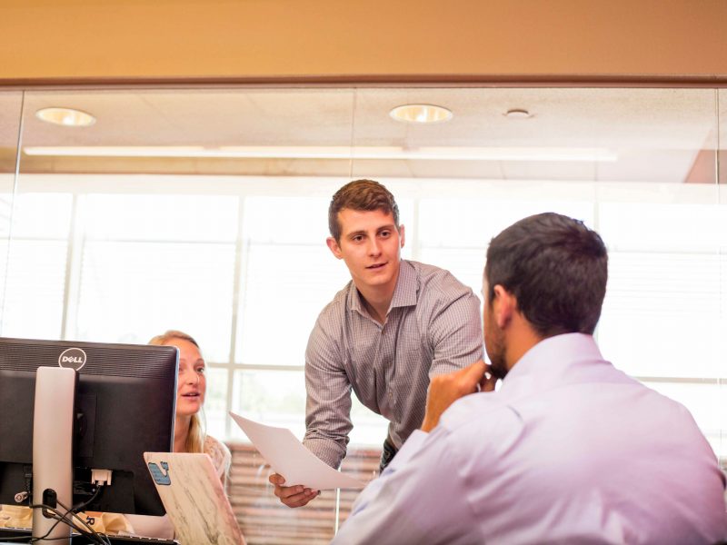 Business students collaborating in a lounge.