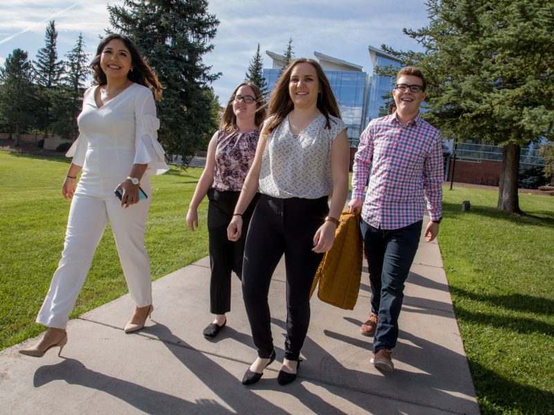 Franke ambassadors walking outside towards the business college.