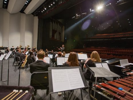 nau symphonic band playing on stage in ardrey auditorium