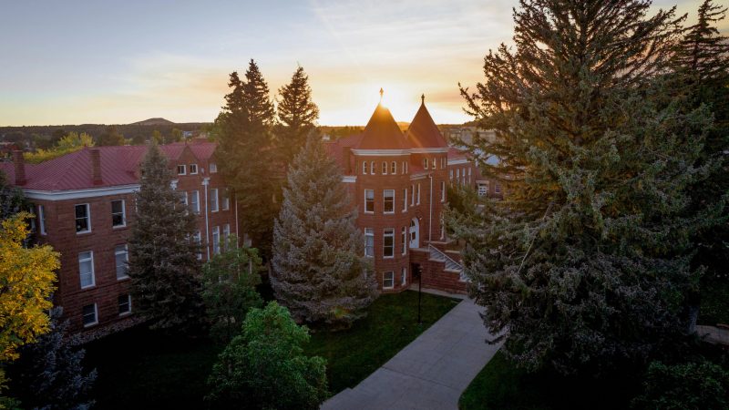 Drone image of Old Main on the N A U Flagstaff Mountain Campus.