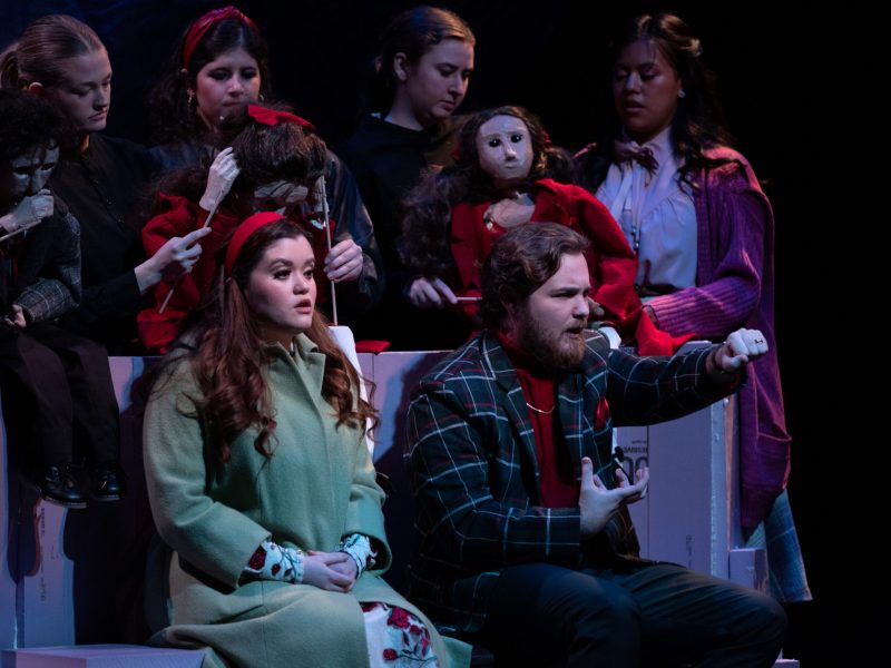 Actors performing a dress rehearsal for a play.