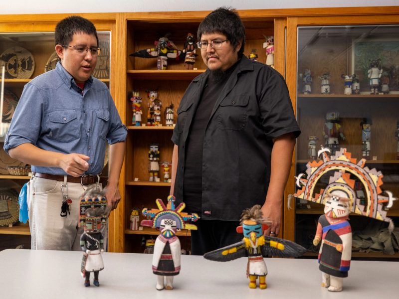 Two people with Katsina collection.