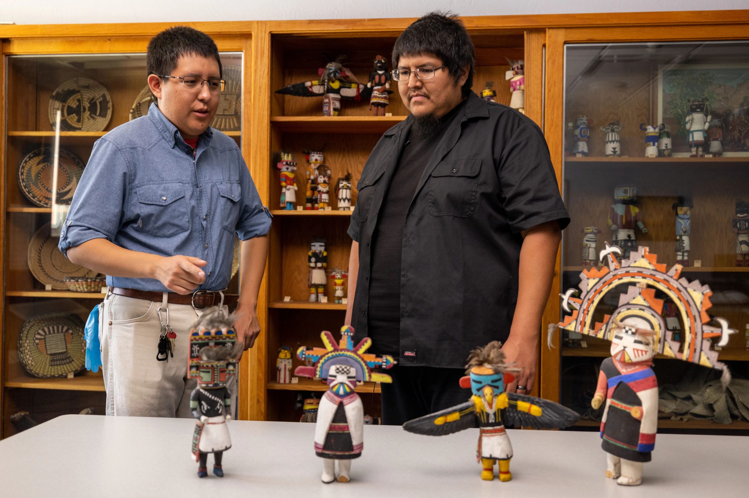 Two people with Katsina collection.