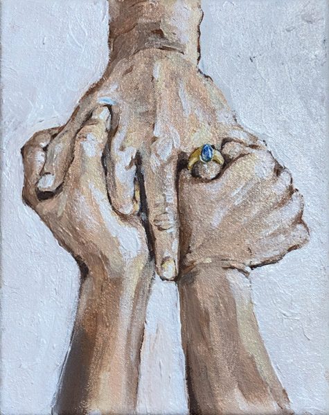 Painting of hands holding each other with a blue gem ring.