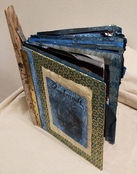 Top view of a mixed media book.