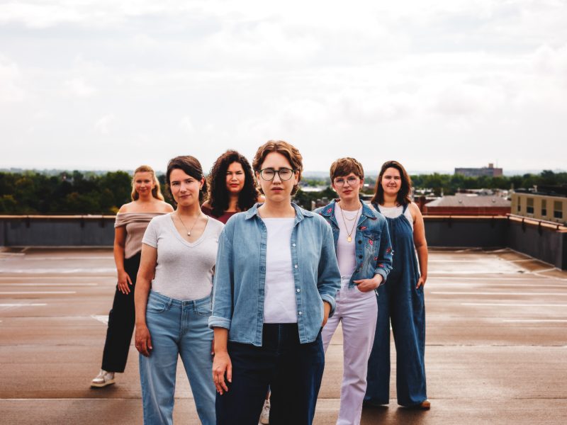 A photo of the 6 members of the all female singer group Lyrra