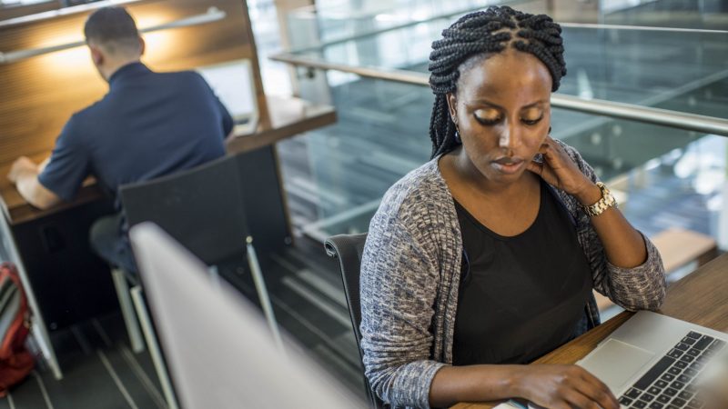 A Northern Arizona University bio med student works online.