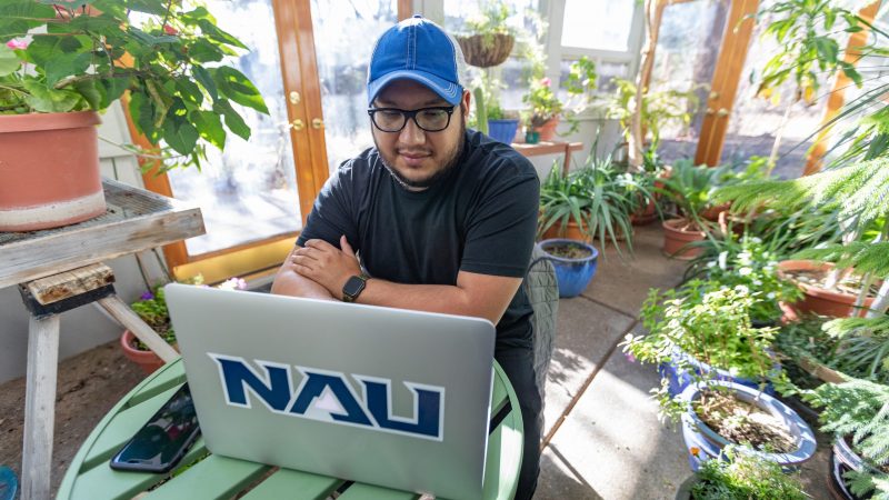 An N A U Online student enrolling in classes.