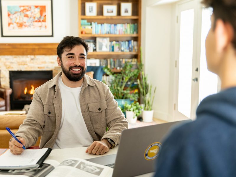 An N A U Online graduate student studies comfortably from home.