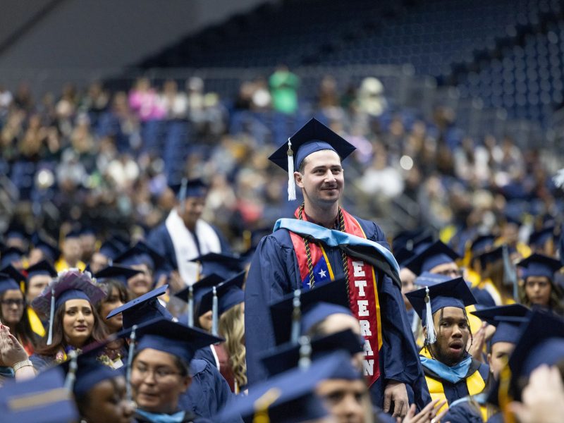 Graduate standing during commencement.