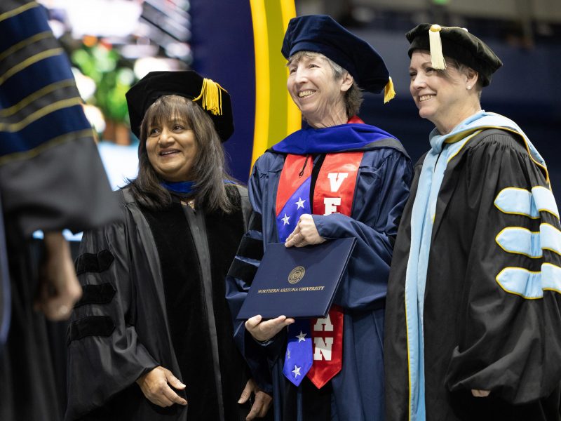 Graduate receiving award.