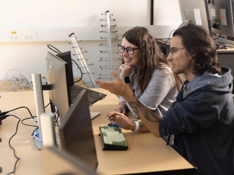 Students discussing with each other.