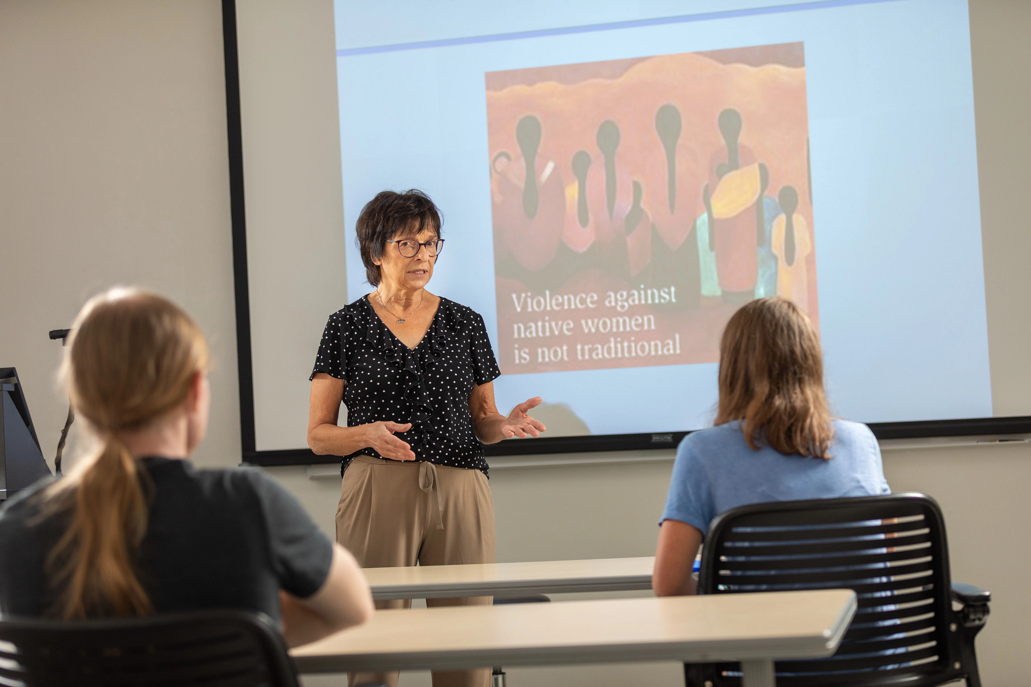 N A U professor lecture to students.