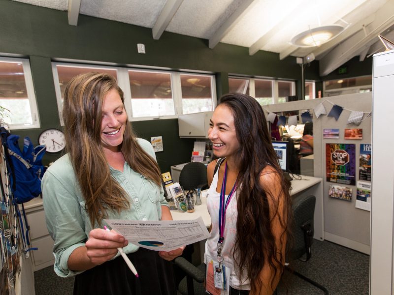 Student being helped by an advisor.