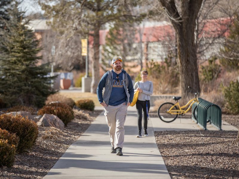 Students walking towards.