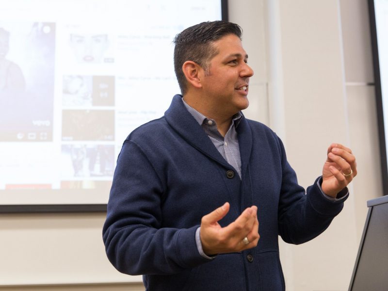 Faculty presenting in a classroom.