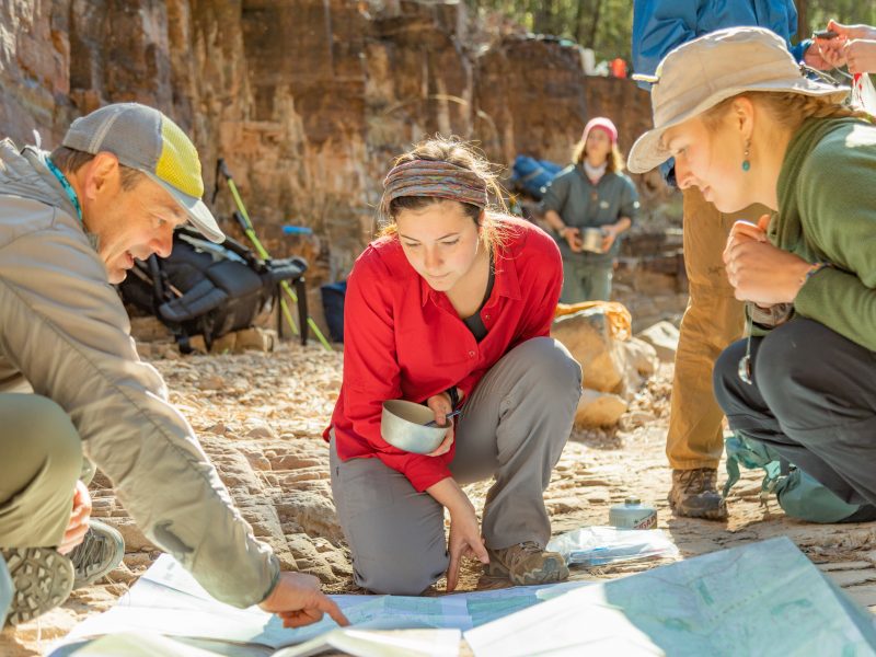 Students collaborating outside.