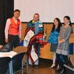 Faculty members smiling for a photograph.