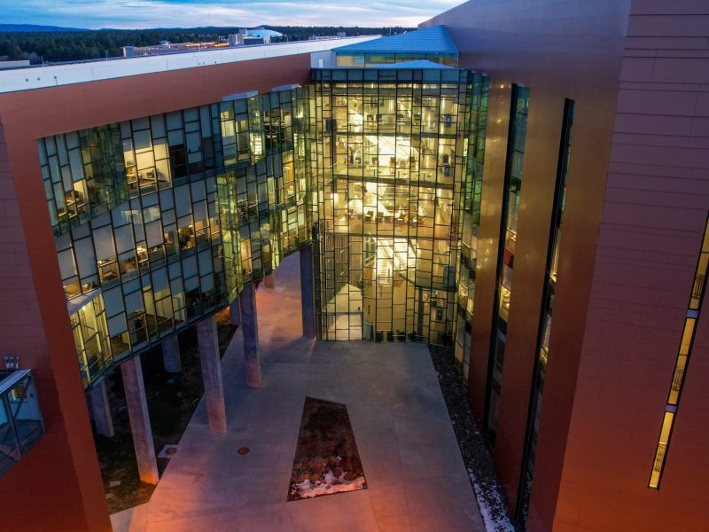 Exterior of science building at night.