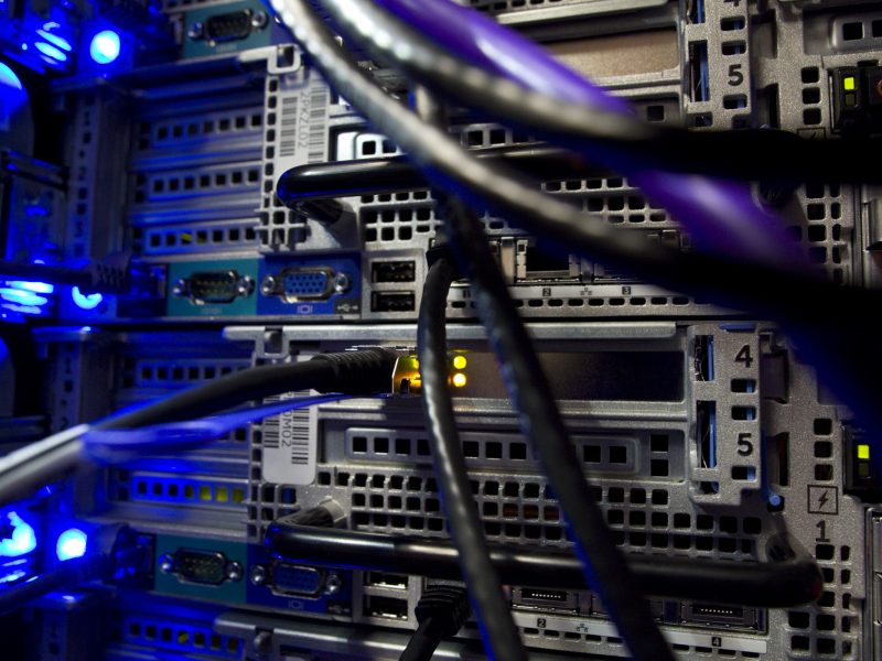 Back side of computer with cords plugged in.