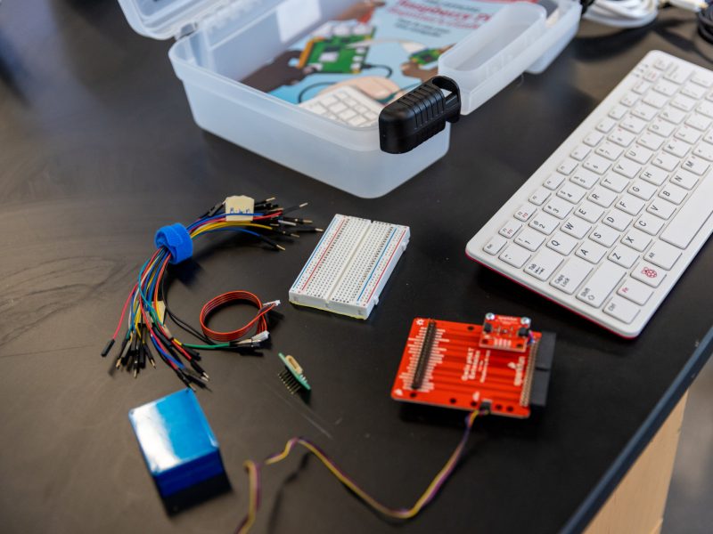 Computer components spread out on a table.