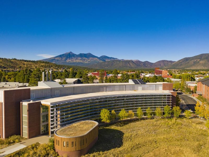 Drone aerial view of the exterior of the Applied and Research Development building located on the N A U campus.