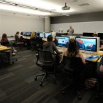Students sitting in a computer lab.