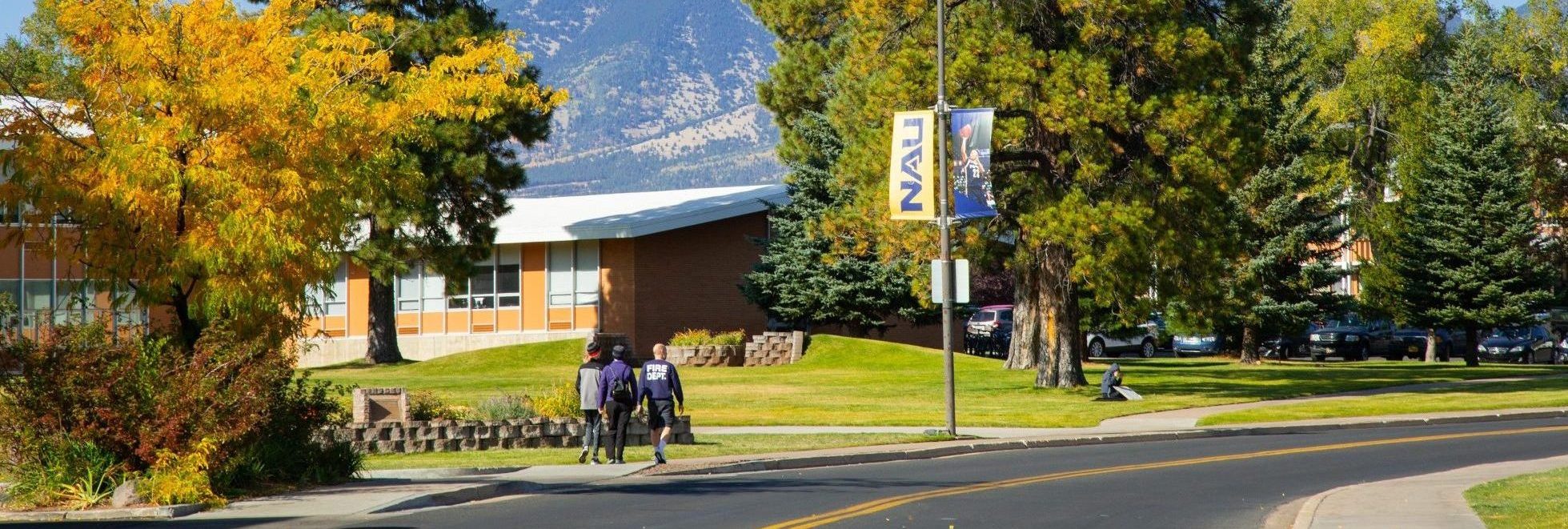 N A U students walking on campus.