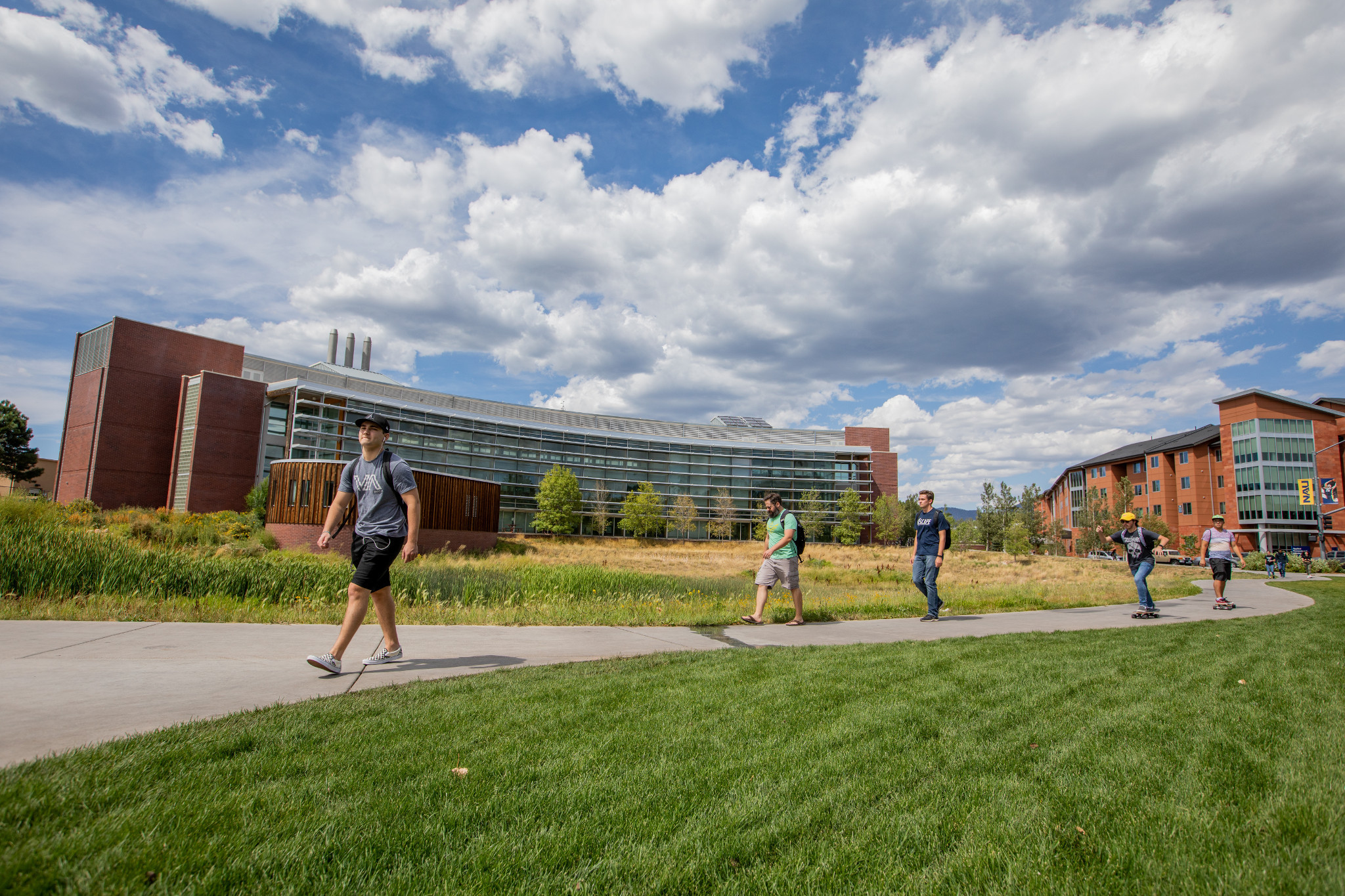 N A U students walking on campus.