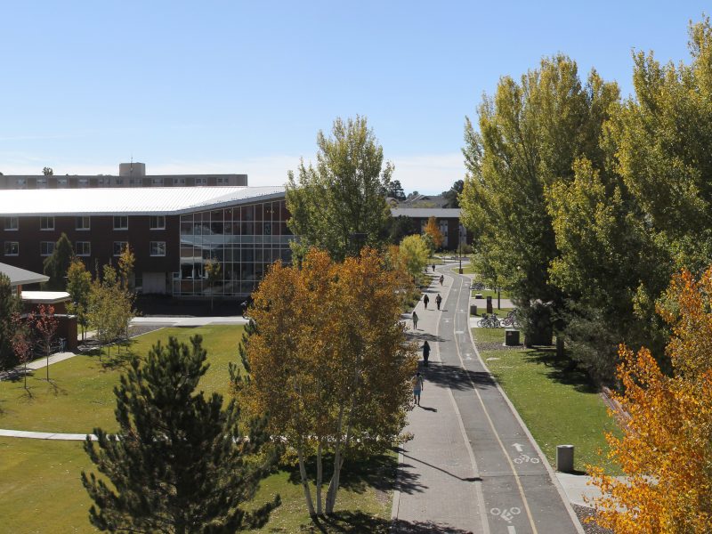 Flagstaff campus in the fall, with orange and green trees.