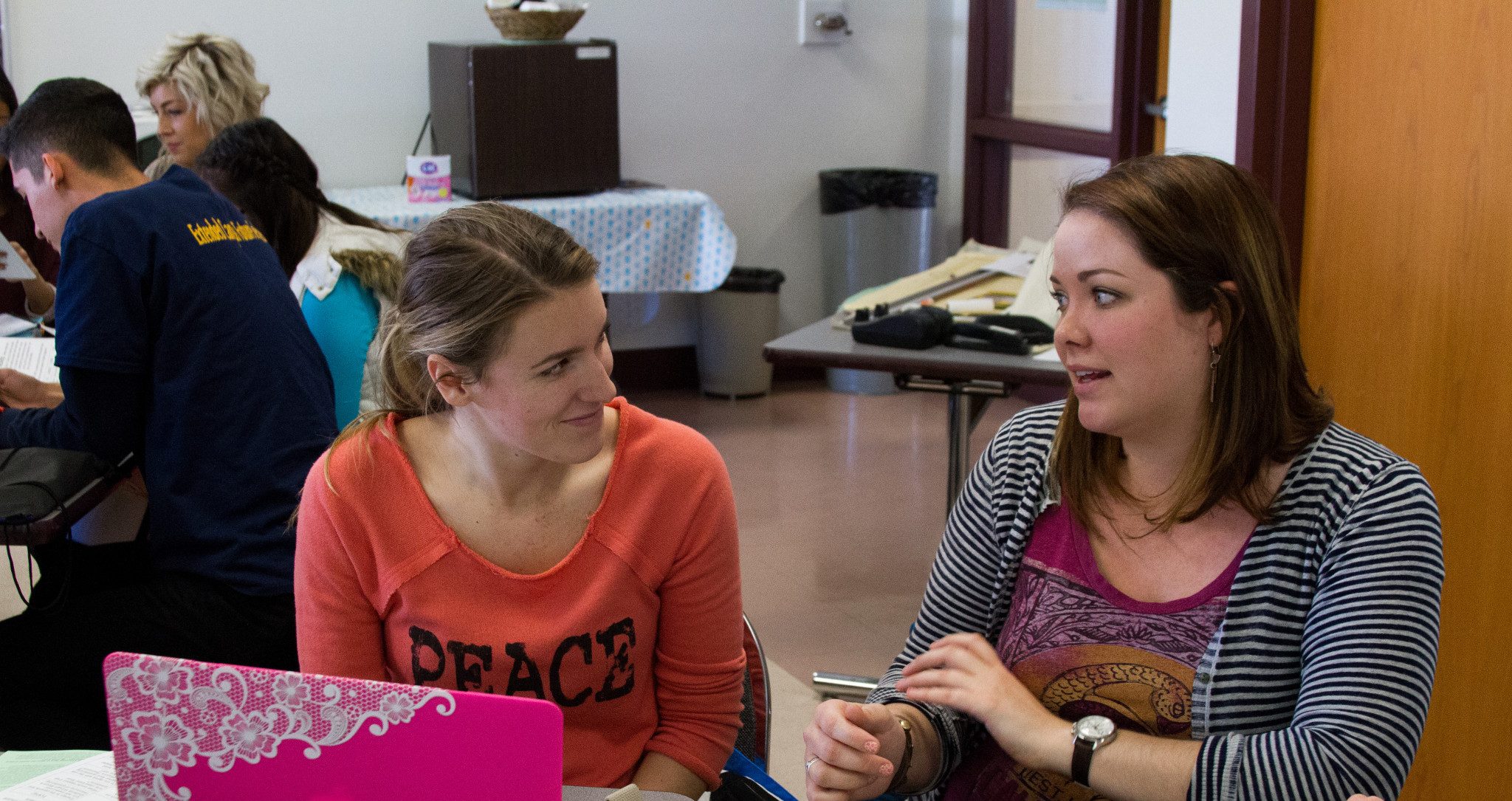 N A U students discussing class work.