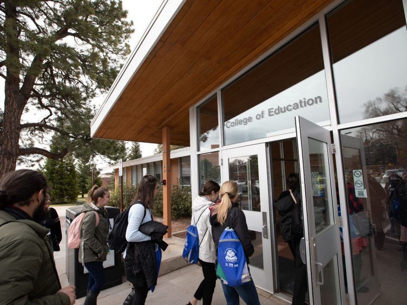 People entering the College of Education building.